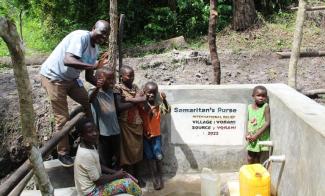 CLEAN WATER SOURCES IN DEMOCRATIC REPUBLIC OF THE CONGO ARE A BLESSING TO REMOTE COMMUNITIES AND A PROTECTION AGAINST DISEASE AND THE DANGERS OF LONG WALKS THROUGH THE BUSH.