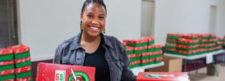 project leader with shoebox gifts