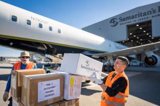 Samaritan's Purse Crisis Response supplies being loaded onto a DC8