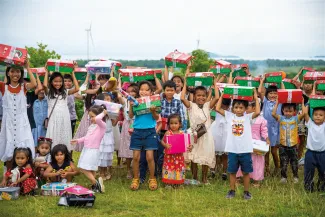 Children happy to receive their shoeboxes