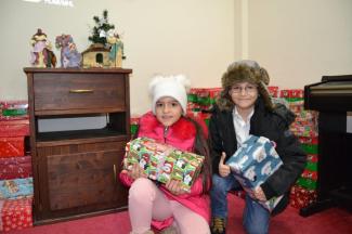 children with shoebox gifts