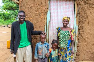 JEAN AND HIS FAMILY, ONE OF SCORES OF FAMILIES DISPLACED BY WAR, NEEDED TO REBUILD THEIR LIVES NEAR BUNIA IN THE DEMOCRATIC REPUBLIC OF THE CONGO.