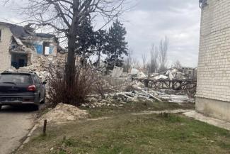 THE MOBILE MEDICAL UNIT IS ESPECIALLY WELCOME BECAUSE THE UKRAINIAN MEDICAL INFRASTRUCTURE HAS BEEN COMPROMISED BY THE WAR. THIS PILE OF RUBBLE IS WHERE A CLINIC ONCE STOOD.