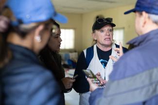 COX’S PASSION GOES BEYOND THE PHYSICAL RELIEF AND TO THE HEART OF THE PEOPLE SHE IS HELPING.