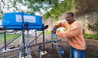 WHEN PAULO VISITED A SAMARITAN’S PURSE WATER POINT TO GATHER DESPERATELY NEEDED DRINKING WATER, HE SAID, “NOT EVEN OUR TREATED WATER IS AS GOOD AS THIS.”