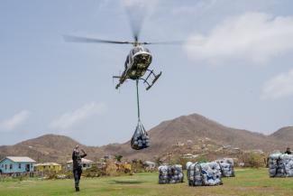 SAMARITAN’S PURSE IS SLING LOADING SUPPLIES FROM OUR HELICOPTER TO REMOTE LOCATIONS IN THE CARIBBEAN.