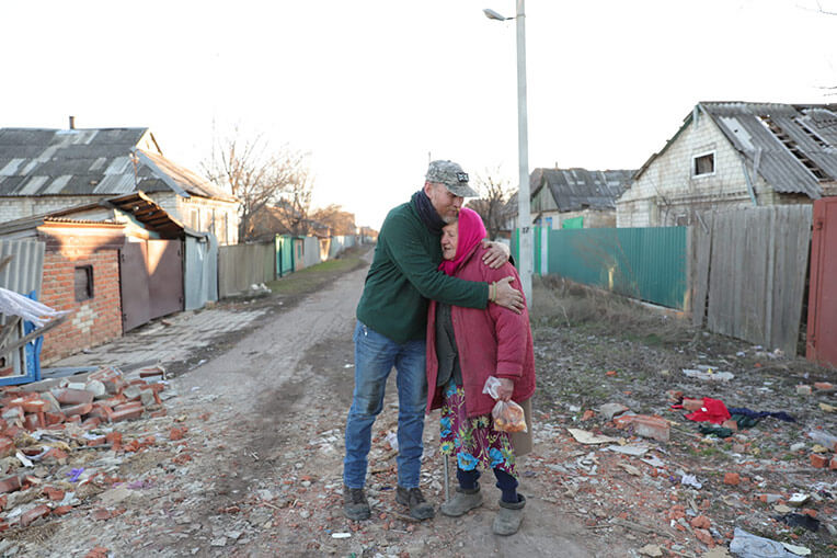 While delivering other supplies, our partner teams also provide desperate grandmothers with much-needed hugs.