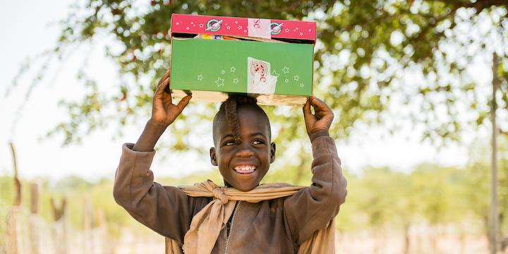 Boy with shoebox