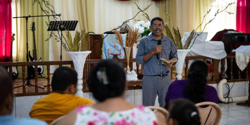 Pastor Rigoberto Mejia preaches at Key Baptist Church. 