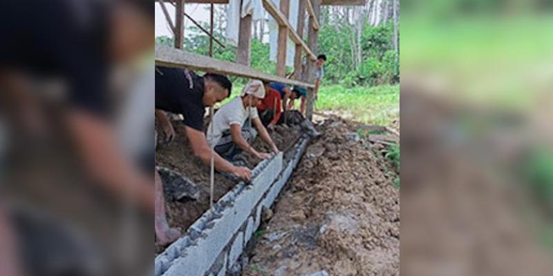 The new believers worked to construct their own church building in the village.