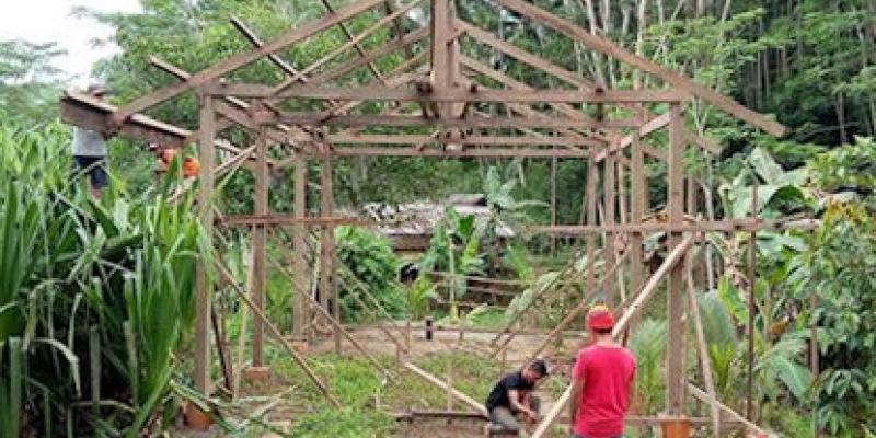 The villagers were able to gather enough lumber to see the walls of the church building go up.