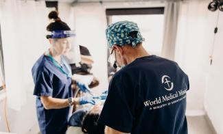 Dr. Zoch (right) joined a group of dedicated medical professionals with World Medical Mission to provide dental care to patients in the remote regions of El Salvador.