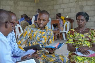 Congolese church leaders gather to learn and discuss the Bible during a portable Bible school session.