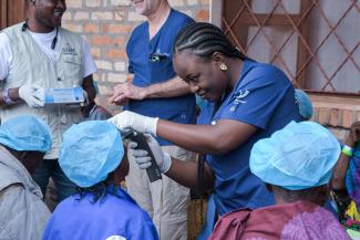 A nurse examines patients following a time of recovery.